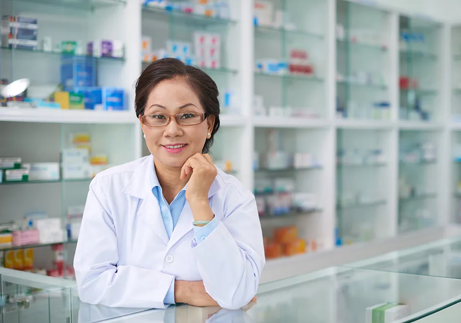 A pharmacist at work behind the counter